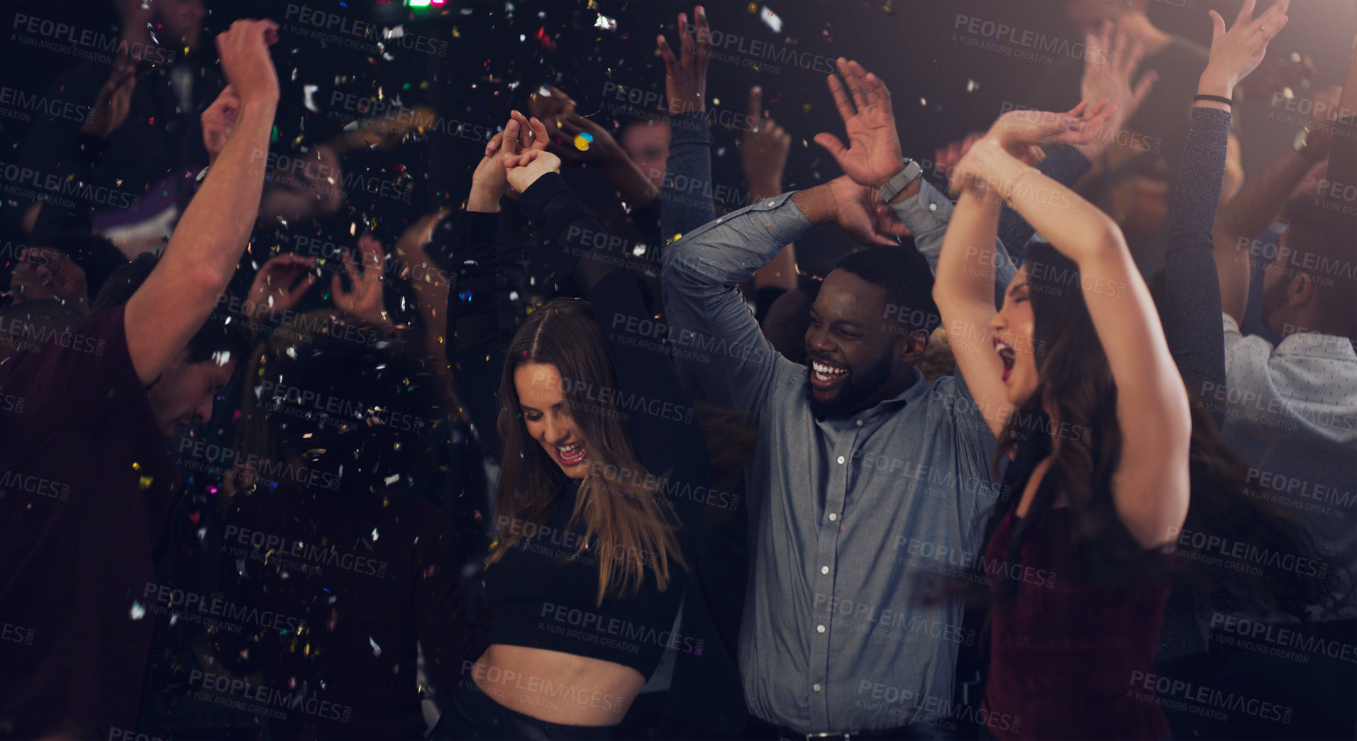 Buy stock photo Friends, celebration and dancing in club with glitter, confetti or new years eve party with happiness, crowd and disco. Dance, people and festival with music, energy and cheering for birthday event
