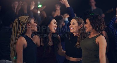 Buy stock photo Music, party and night with women in club for dance, celebration and nightlife concert. Festival, disco and happy hour with friends dancing in crowd at social event for energy, techno and dj show