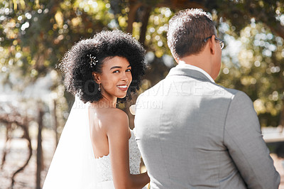 Buy stock photo Portrait of a happy young bride getting walk down the aisle by her father on her wedding day