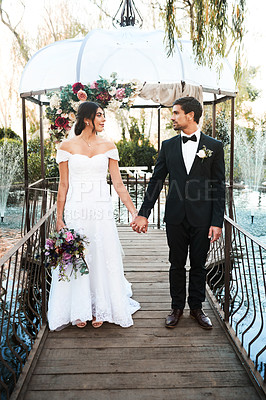 Buy stock photo Love, wedding and couple holding hands, outdoor and relationship with joy, happiness and romantic. Partners, bride and groom with support, loving or marriage with romance, celebration and commitment