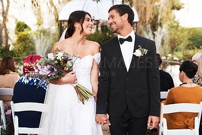 Buy stock photo Man, woman and couple holding hands at wedding ceremony with flower bouquet, marriage or celebration. Bride, groom and guests at outdoor park or party for summer reception, backyard or commitment