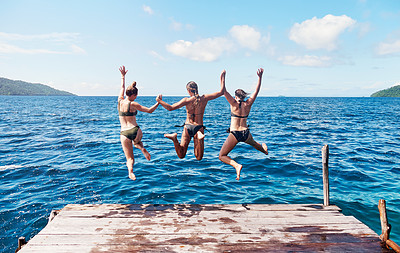 Buy stock photo Back, group and women on a pier, jump and beach with vacation, summer getaway or relax. Female people, girls or friends with water, ocean and sea with holiday, lake and travel with freedom and energy