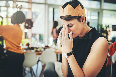 Buy stock photo Cropped shot of an attractive young woman looking frustrated while taking a phonecall on Christmas day at home