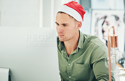 Buy stock photo Businessman, computer and working with christmas hat in office at digital marketing job on internet. Man, holiday and work on pc, web or online with festive clothes, celebration or focus in workplace