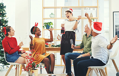 Buy stock photo Christmas, party and champagne with business people in office for celebration, merry and festive season. Holiday, xmas and support with employee and wine for diversity, event and content together