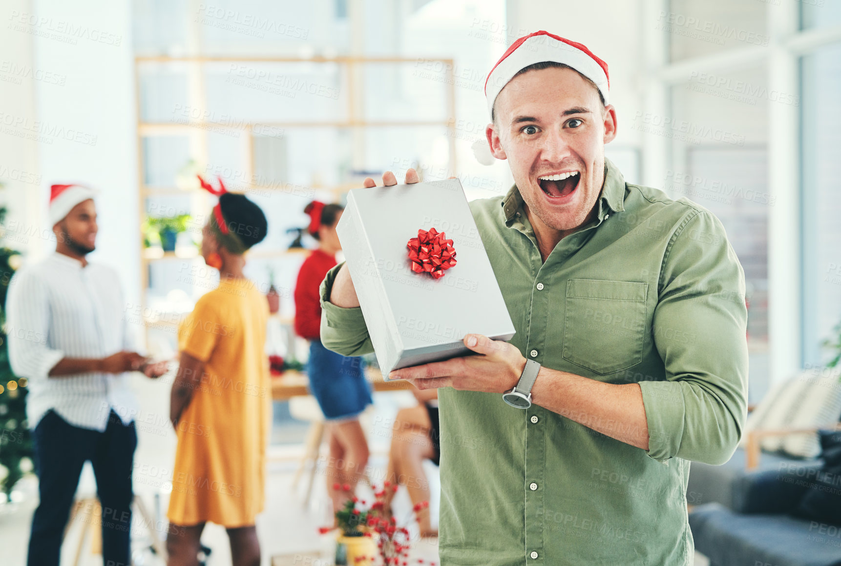 Buy stock photo Wow, gift and businessman happy at a Christmas party for work celebration in the office. Smile, surprise and portrait of an excited employee with a present box at a professional company event