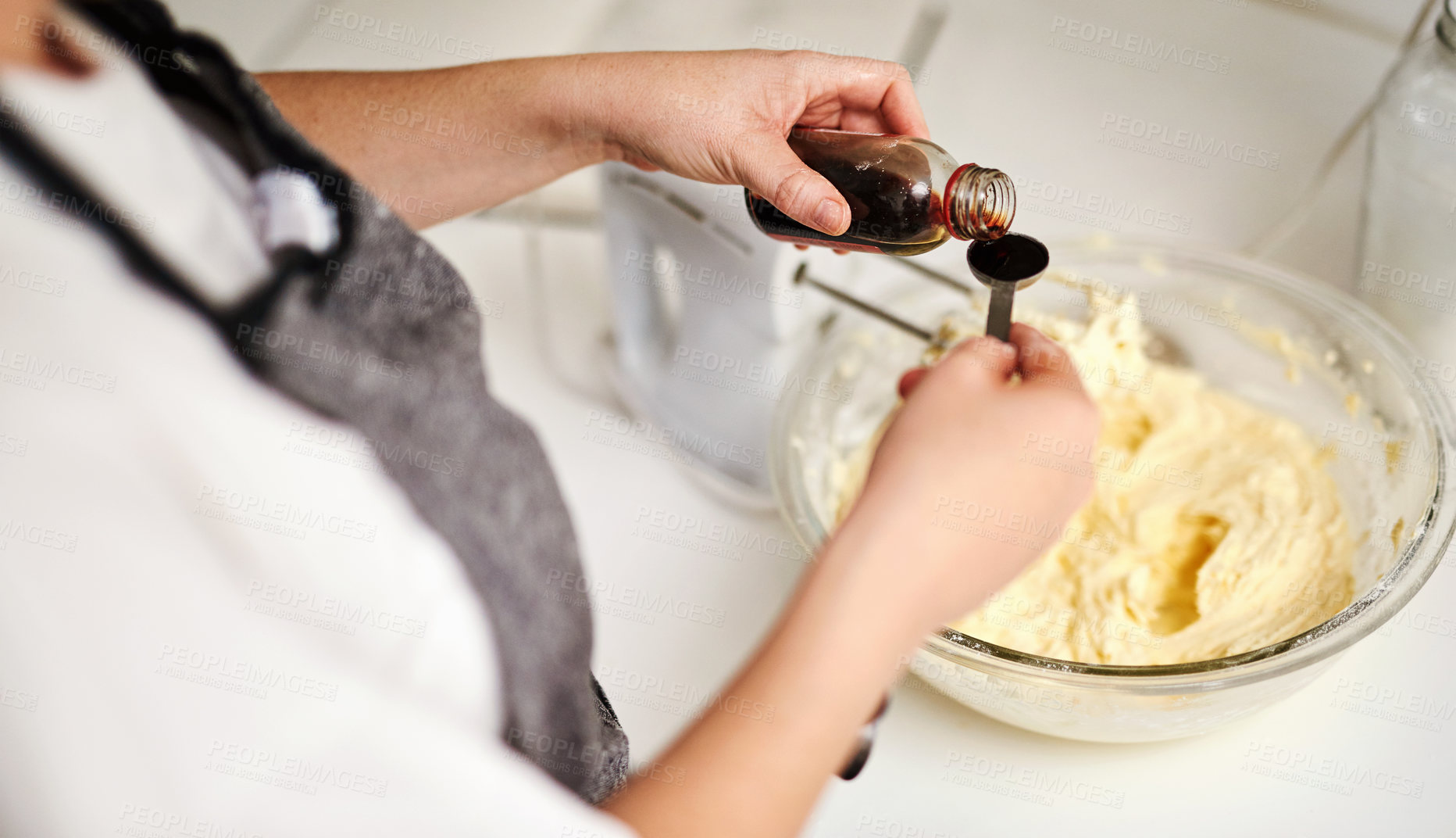 Buy stock photo Person, bowl and baking with hands for prepare in house with chef for hobby in kitchen. Cooking, professional and dessert with mixture for small business or home recipe with fresh vanilla or icing.