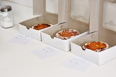 Buy stock photo Cropped shot of freshly baked cakes in takeaway boxes