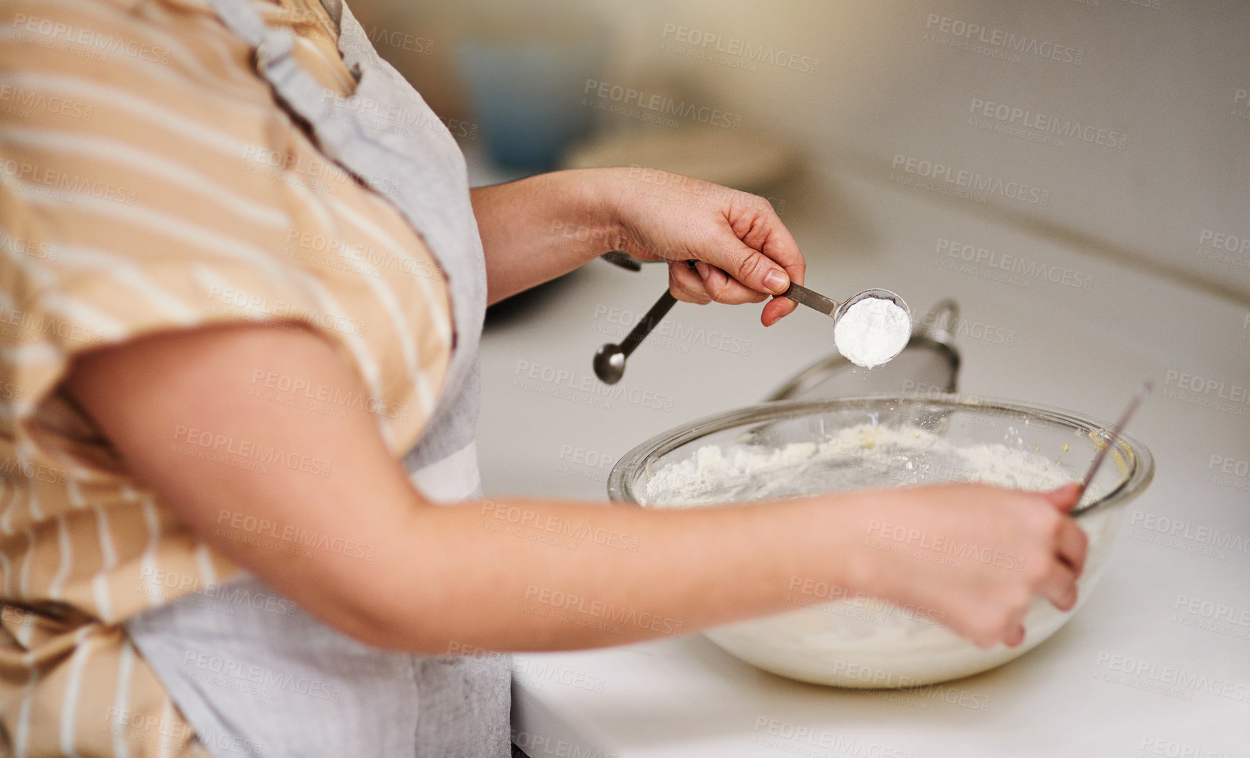 Buy stock photo Hands, kitchen and flour for baking, home and glass bowl for dessert or small business. Baker, ingredients and measurement with spoon, house or startup bakery for recipe prepare or sweet food process