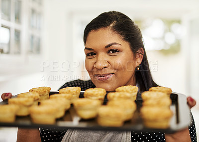 Buy stock photo Cropped shot of a woman holding up freshly baked pies