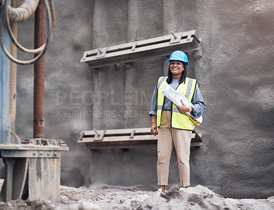 Buy stock photo Cropped portrait of an attractive young female construction worker working on site