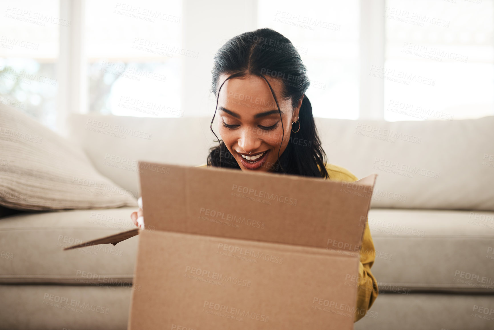 Buy stock photo Home, woman or excited with box for opening, shipment or delivery product in living room with smile. House, female person or happy with package for surprise, present or cardboard for parcel in lounge