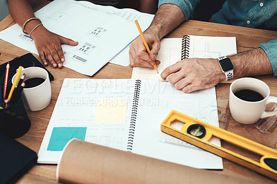 Buy stock photo Cropped shot of two unrecognizable architects working together in a modern office