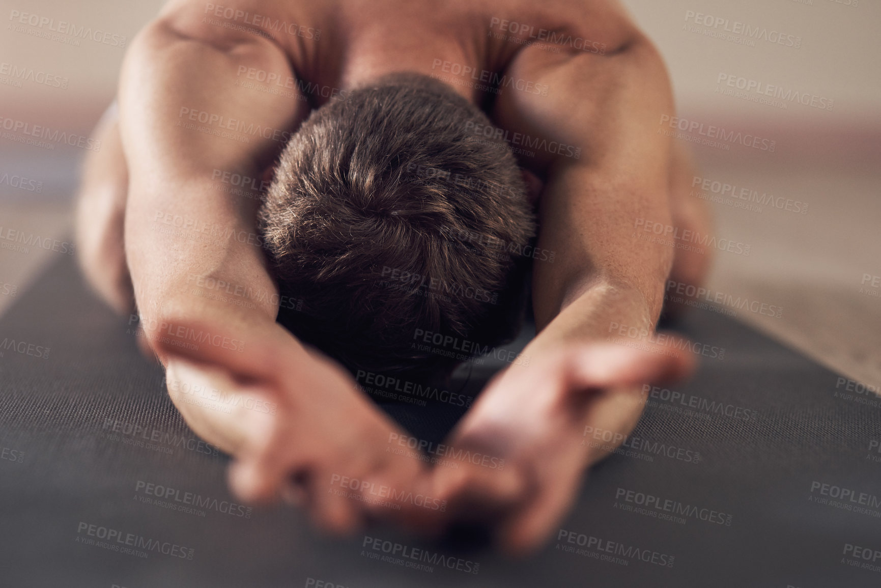 Buy stock photo Man, yoga class and stretching on mat for wellness, mindfulness and exercise for peace, flexibility and zen. Male person, pose and meditation in studio for mental health, physical strength and calm