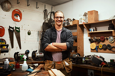 Buy stock photo Happy man, portrait and carpenter with confidence at workshop for woodwork, skill or talent in garage. Young, male person or professional artisan with arms crossed for timber or carpentry business