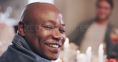 Buy stock photo Dinner party, candles and portrait of African man with friends in house for birthday, celebration and food. Christmas meal, table and male person with people in home for social, holiday and eating
