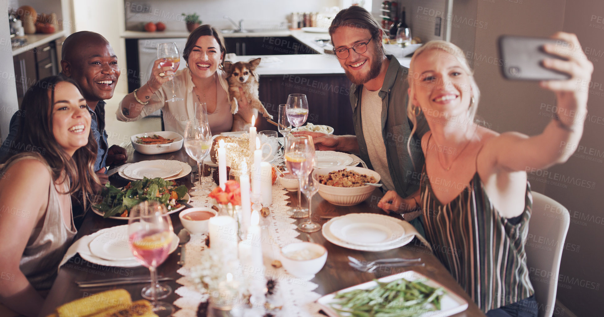 Buy stock photo Diversity, dining table and friends taking a selfie at dinner, party or event at a modern home. Happy, smile and young people taking a picture together while eating a lunch meal with wine in a house.