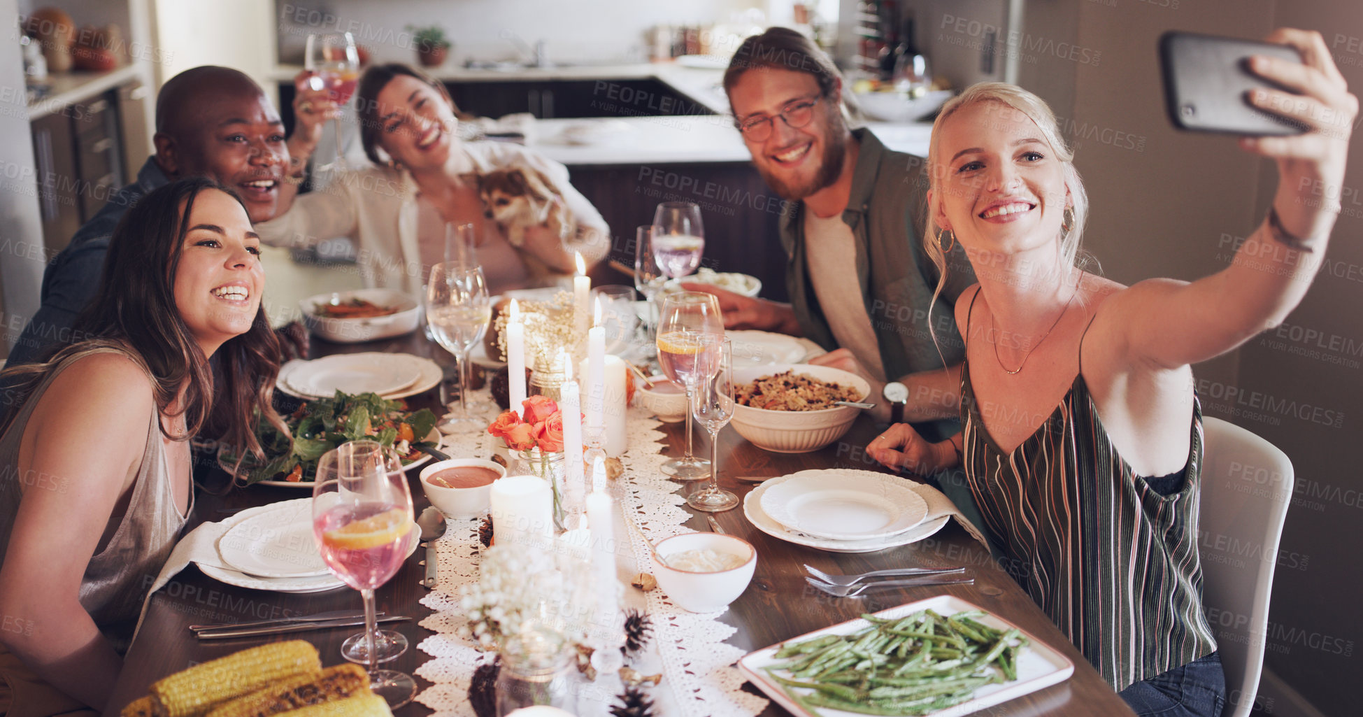 Buy stock photo Selfie, dinner and party with friends eating food together for a new year celebration or event. Home, feast and meal with a man and woman friend group sitting at a table for a social gathering