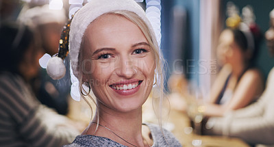 Buy stock photo Woman, portrait and Christmas hat at dinner party for festive season or holiday celebration, friends or family. Female person, face and smile at table for vacation or hosting in home, relax or event