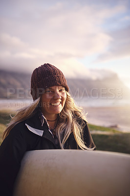 Buy stock photo Shot of an attractive young woman out surfing in the wilderness