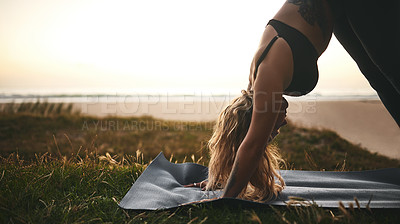 Buy stock photo Fitness, yoga and sunset with woman outdoor on mat for balance, inner peace or mindfulness. Exercise, horizon and meditation with yogi person on grass in nature for health, wellness or zen closeup