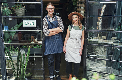 Buy stock photo Florist, partners and smile on portrait at door with open sign for startup store operation in France. People, woman and man with happy or proud in confident for small business and flower shop