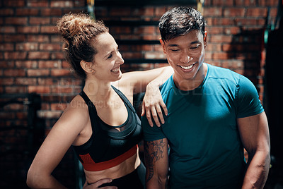 Buy stock photo Cropped shot of two young sportspeople standing together in a gym