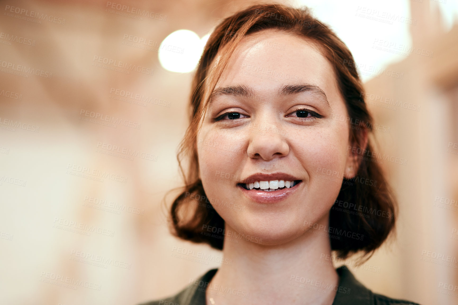 Buy stock photo Cropped shot of a young female carpenter smiling at the camera