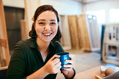 Buy stock photo Cropped shot of a female carpenter sitting at her desk in a workshop