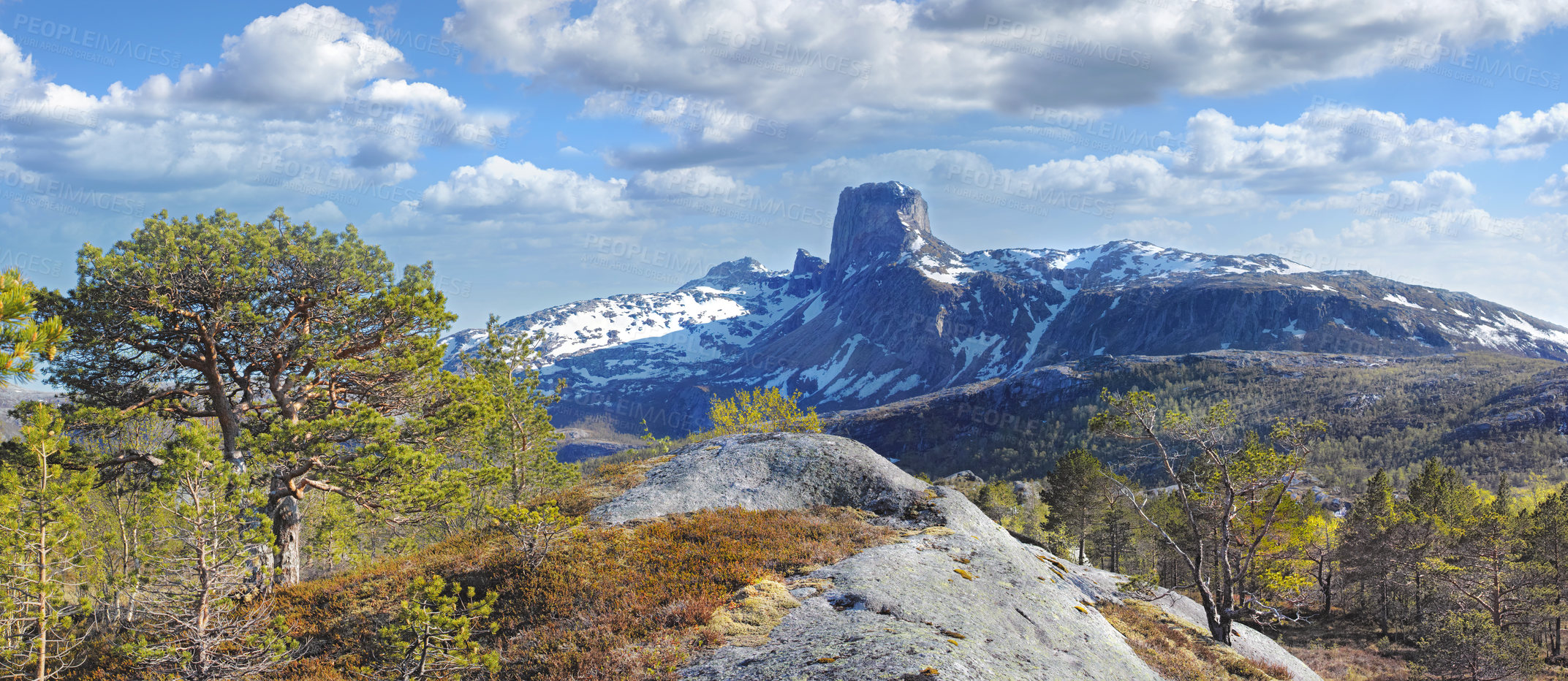 Buy stock photo Landscape view of mountain snow, blue sky with clouds and copy space in Norway. Hiking, discovering scenic countryside on cold winter day. Sun shining on vast background of nature expanse with trees