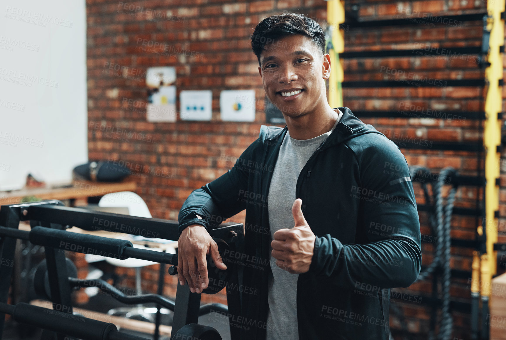 Buy stock photo Man, fitness instructor and thumbs up at gym in portrait, training or excited with sign for wellness. Asian personal trainer, equipment or emoji with exercise, workout or happy for health in Taiwan