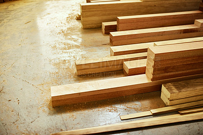 Buy stock photo Still life shot of piles of wood stacked inside a carpentry workshop