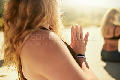 Buy stock photo Namaste, meditation and women on beach together with peace, health or wellness for holistic care. Zen, relax and group of people at ocean for mindfulness, calm morning or outdoor yoga class in nature