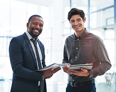 Buy stock photo Cropped portrait of two young businessmen standing in a modern office