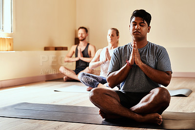 Buy stock photo Meditation, yoga and floor with man in class for holistic health, zen and workout. Pilates, exercise and healing with group of friends for breathing, prayer hands and wellness balance together