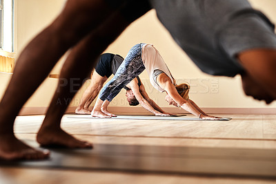 Buy stock photo Downward dog, yoga and peace with people in class for holistic health, flexibility and workout. Pilates, exercise and healing with group of friends in studio for breathing, zen and wellness balance