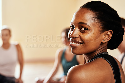 Buy stock photo Portrait of a confident young woman attending a yoga class
