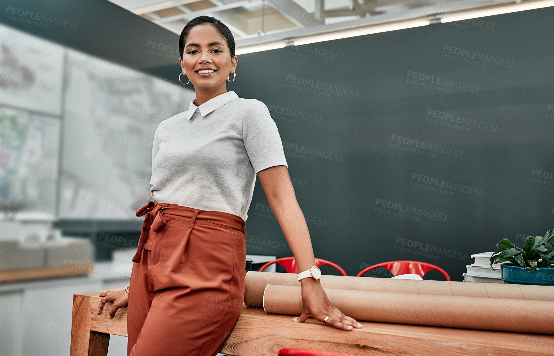 Buy stock photo Portrait of a young architect standing in an office