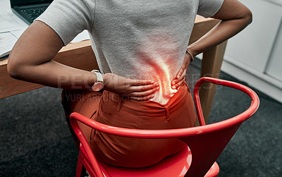 Buy stock photo Closeup shot of an unrecognisable businesswoman suffering with back pain while working in an office