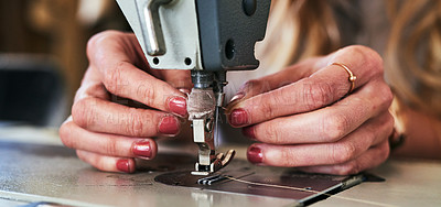 Buy stock photo Workshop sewing machine, woman hands and fashion designer with button and thread work. Small business, entrepreneur and female tailor with boutique and employee working with machinery for clothing