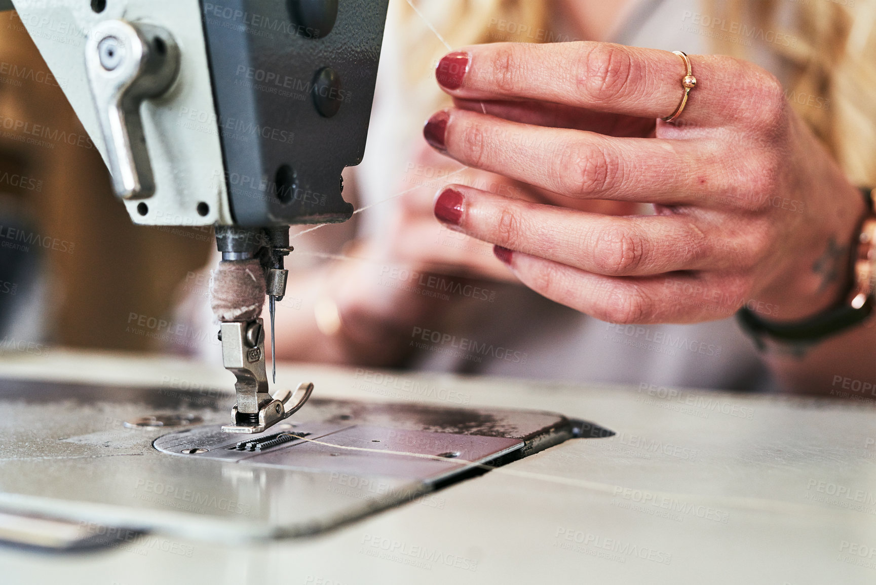 Buy stock photo Sewing machine, seamstress woman hands and fashion designer with thread work. Small business, entrepreneur and female tailor with boutique and creative worker working with machinery for clothing