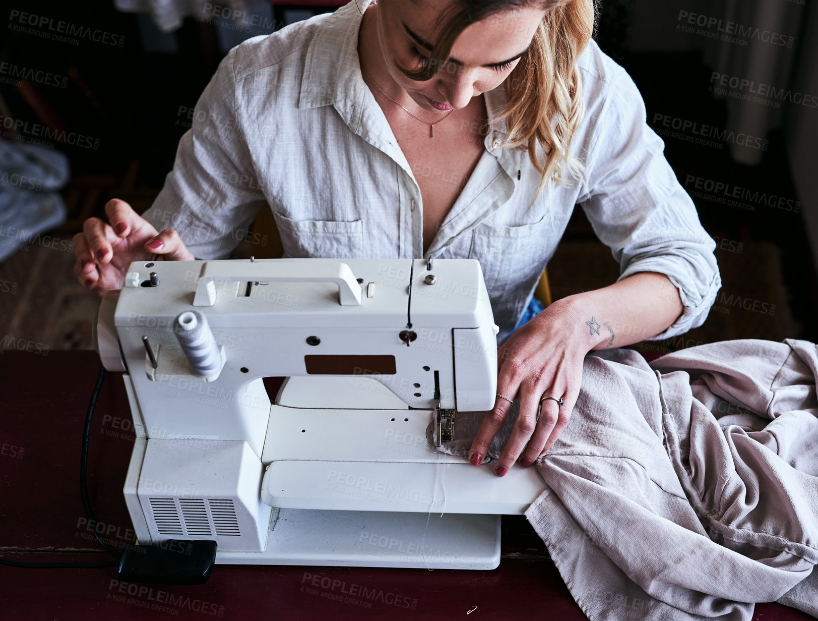 Buy stock photo Fashion, design and woman at sewing machine from above, small business with creative ideas and focus at workshop. Creativity, textile start up and designer, tailor or entrepreneur at table stitching.