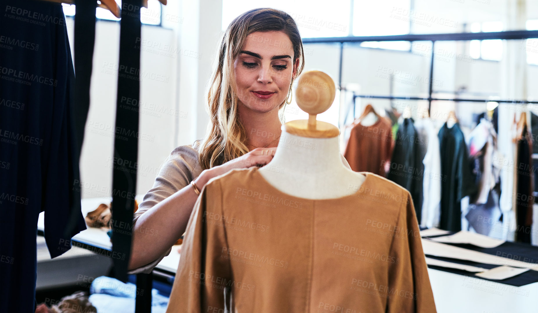 Buy stock photo Fashion designer, mannequin and business woman with clothes, material and fabric in creative studio. Entrepreneur, seamstress and person in workshop for style, apparel and tailor in retail boutique 