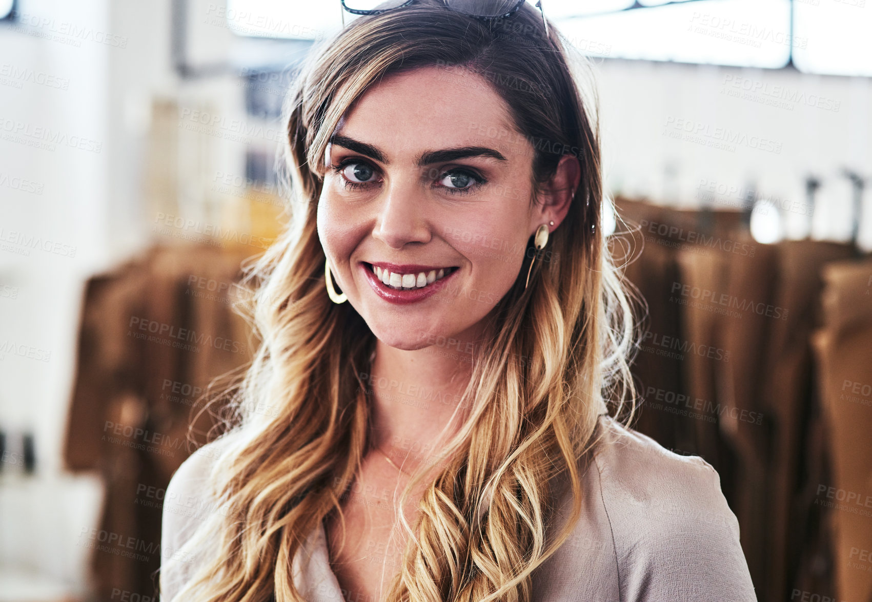 Buy stock photo Portrait of a young fashion designer standing in her workshop