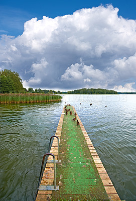 Buy stock photo A landscape pier and lake