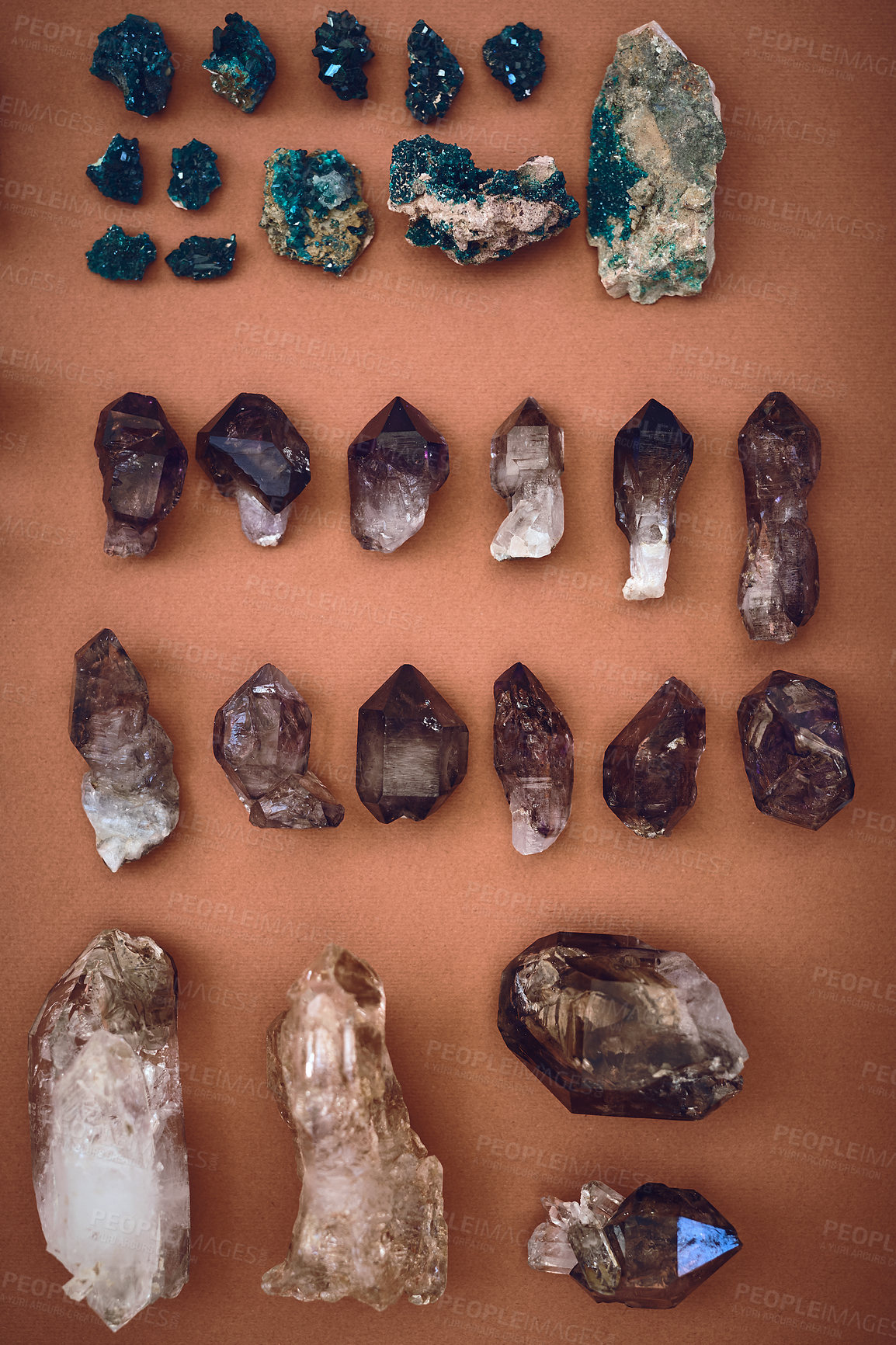 Buy stock photo High angle shot of a table filled with different types of crystals inside during the day