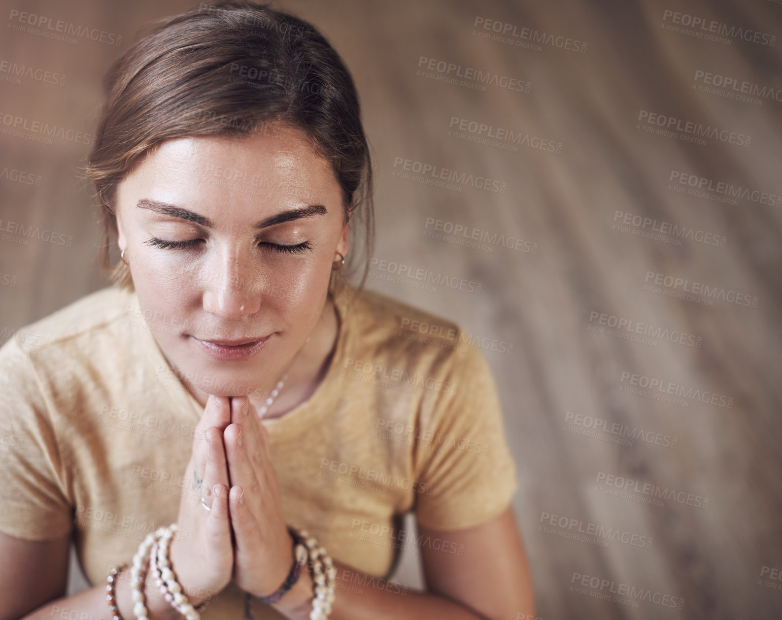 Buy stock photo Yoga, girl and namaste for peace, meditation and spiritual awareness or reiki balance. Female person, self care and healing aura for mental health or relax in studio, mindfulness and mala beads