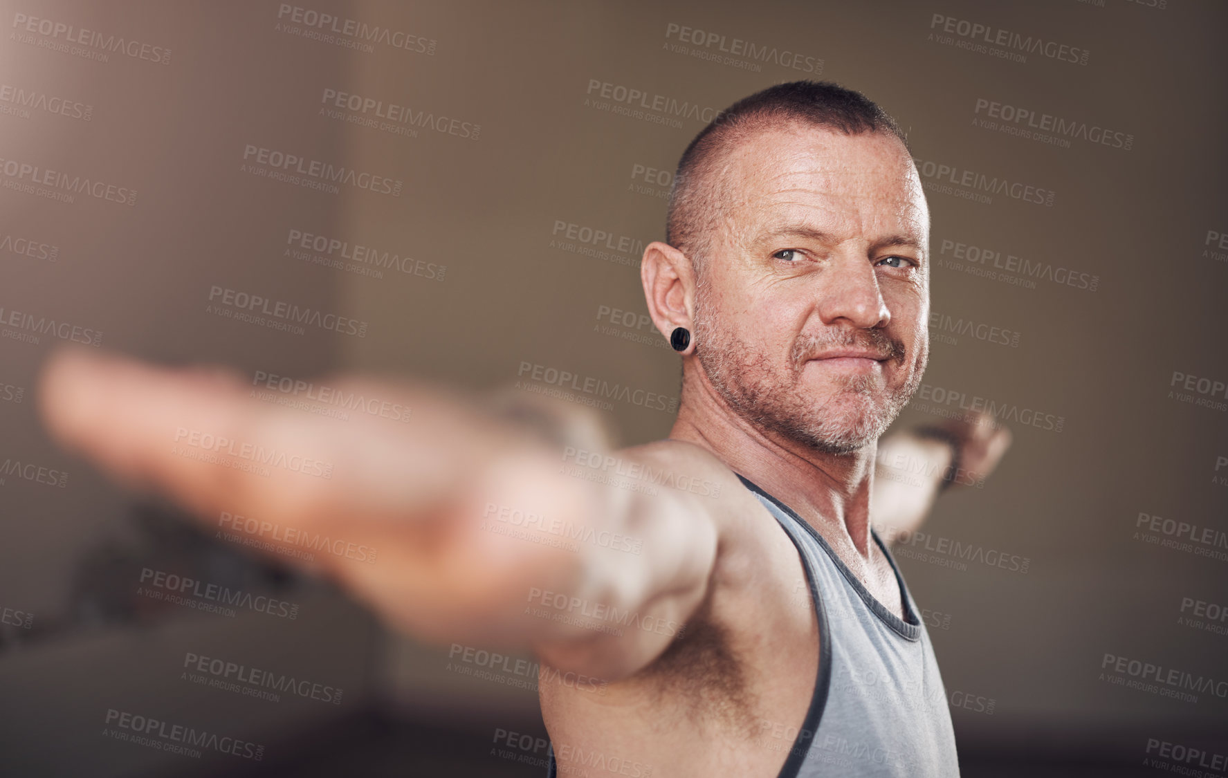 Buy stock photo Man, yoga or warrior pose in house for health, wellness or body flexibility for practice routine in studio. Thinking, zen yogi or male person in pilates session for mindfulness, wellbeing or balance