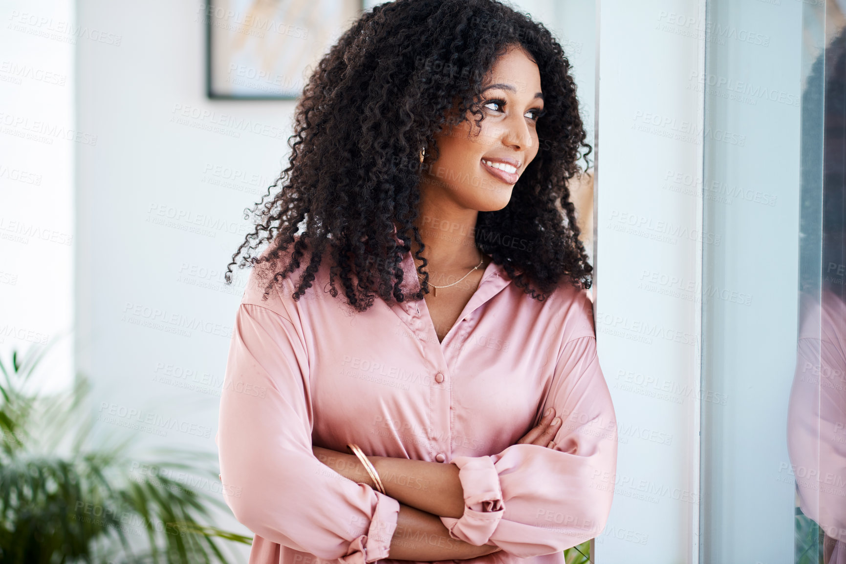 Buy stock photo Thinking, business woman or arms crossed in office with confidence of ideas, growth or career goals. Creative writer, smile or african employee at window in publishing, content creation or journalist