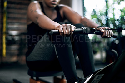 Buy stock photo Black woman, row machine and hands for fitness, training and gym for sports workout. Exercise, bodybuilder and cardio for body health and wellness, active and challenge for African person in studio